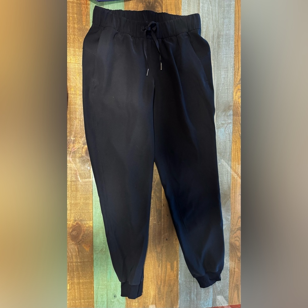 Like New Lululemon, women's size 4 black joggers.